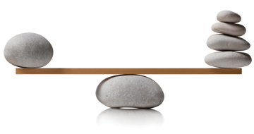 rocks balancing on a scale